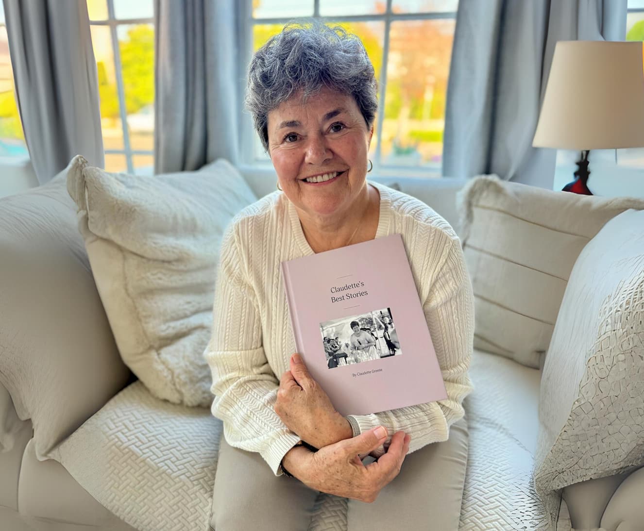 Person holding a photo album